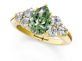 Yellow gold Fancy Green Pear  Cut Diamond Cluster Ring with Round Accent Stones and Prong Setting on a Classic Band_52