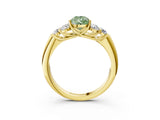 Yellow gold Fancy Green Pear  Cut Diamond Cluster Ring with Round Accent Stones and Prong Setting on a Classic Band_54
