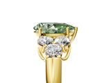 Yellow gold Fancy Green Pear  Cut Diamond Cluster Ring with Round Accent Stones and Prong Setting on a Classic Band_56