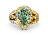 Yellow gold Fancy Green Pear Cut Diamond Halo Ring with Split Shank and Bezel Accents and Four-Prong Setting