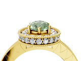 Yellow gold Fancy Green Pear Cut Diamond Milgrain Halo Engagement Ring with Round Pavé Band and Prong Setting_16