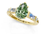 Yellow gold Fancy Green Pear  Cut Diamond Ring with Baguette Side Stones, Channel Set Band, and Four-Prong Setting_25