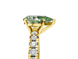 Yellow gold Fancy Green Pear Cut Diamond Solitaire Pavé Engagement Ring with Round Band and Prong Setting_71