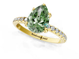 Yellow gold Fancy Green Pear Cut Diamond Solitaire Ring with Four-Prong Setting and Pavé Band_4