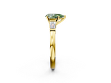 Yellow gold Fancy Green Pear  Cut Diamond Solitaire Ring with Tapered Baguette Accents and Four-Prong Setting_46