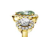 Yellow gold Fancy Green Pear Cut Diamond Three-Stone Halo Ring with Prong Setting and Pavé Accents_5