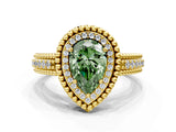 Yellow gold Fancy Green Pear Cut Halo Diamond Ring with Beaded Split Shank and Four-Prong Setting