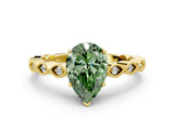 Yellow gold Fancy Green Pear Cut Solitaire Diamond Ring with Infinity Twist Band and Four-Prong Setting
