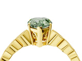 Yellow gold Fancy Green Pear Cut Solitaire Diamond Ring with Infinity Twist Band and Four-Prong Setting_4