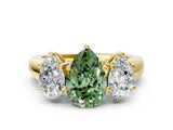 Yellow gold Fancy Green Pear Cut Three-Stone Diamond Ring with Prong Setting on a Classic Band_12