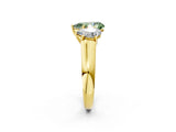Yellow gold Fancy Green Pear Cut Three-Stone Diamond Ring with Prong Setting on a Classic Band_14