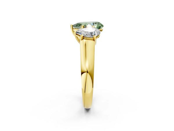 Yellow gold Fancy Green Pear Cut Three-Stone Diamond Ring with Prong Setting on a Classic Band