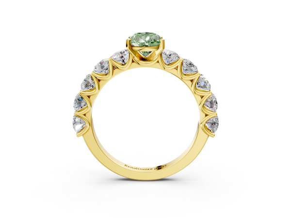 Yellow gold Fancy Green Pear Cut Diamond Prong Setting with Side Stones on a Pave Band