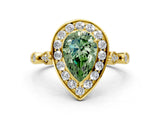 Yellow gold Fancy Green Pear  Halo Diamond Engagement Ring with Twisted Band and Four-Prong Setting