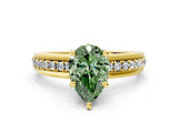Yellow gold Fancy Green Pear  Solitaire Diamond Ring with Channel Set Band and Six-Prong Setting_48