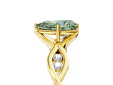 Yellow gold Fancy Green Pear  Solitaire Twist Band with Leaf Prong Setting