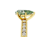 Yellow gold Fancy Green Pear  Solitaire with Pavé Band and Four-Prong Setting_323