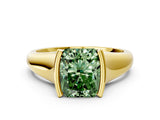 Yellow gold Fancy Green Radiant Cut Solitaire Tension Set Diamond Ring with Split Shank Band