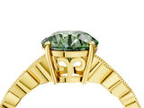 Yellow gold Fancy Green Round Cut Solitaire Diamond Ring with Infinity Twist Band and Four-Prong Setting_16