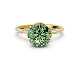 Yellow gold Fancy Green Round Cut Solitaire Split Shank Pave Diamond Engagement Ring with Four-Prong Setting