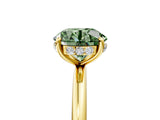 Yellow gold Fancy Green Round  Solitaire Diamond Ring with a Classic Band and Four-Prong Setting