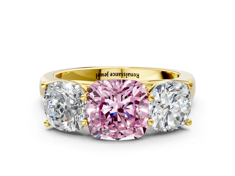 Yellow gold Fancy Pink Cushion Cut Three-Stone Diamond Ring with Prong Setting on a Classic Band
