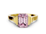 Yellow gold Fancy Pink Emerald Cut Brilliant Solitaire Diamond Ring with Channel Set Band and Bar Prong Setting