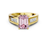 Yellow gold Fancy Pink Emerald Cut Cut Channel Set Solitaire Ring with Four-Prong Setting