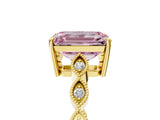 Yellow gold Fancy Pink Emerald Cut Solitaire Diamond Ring with Infinity Twist Band and Four-Prong Setting_5