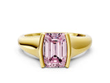 Yellow gold Fancy Pink Emerald Cut Solitaire Tension Set Diamond Ring with Split Shank Band