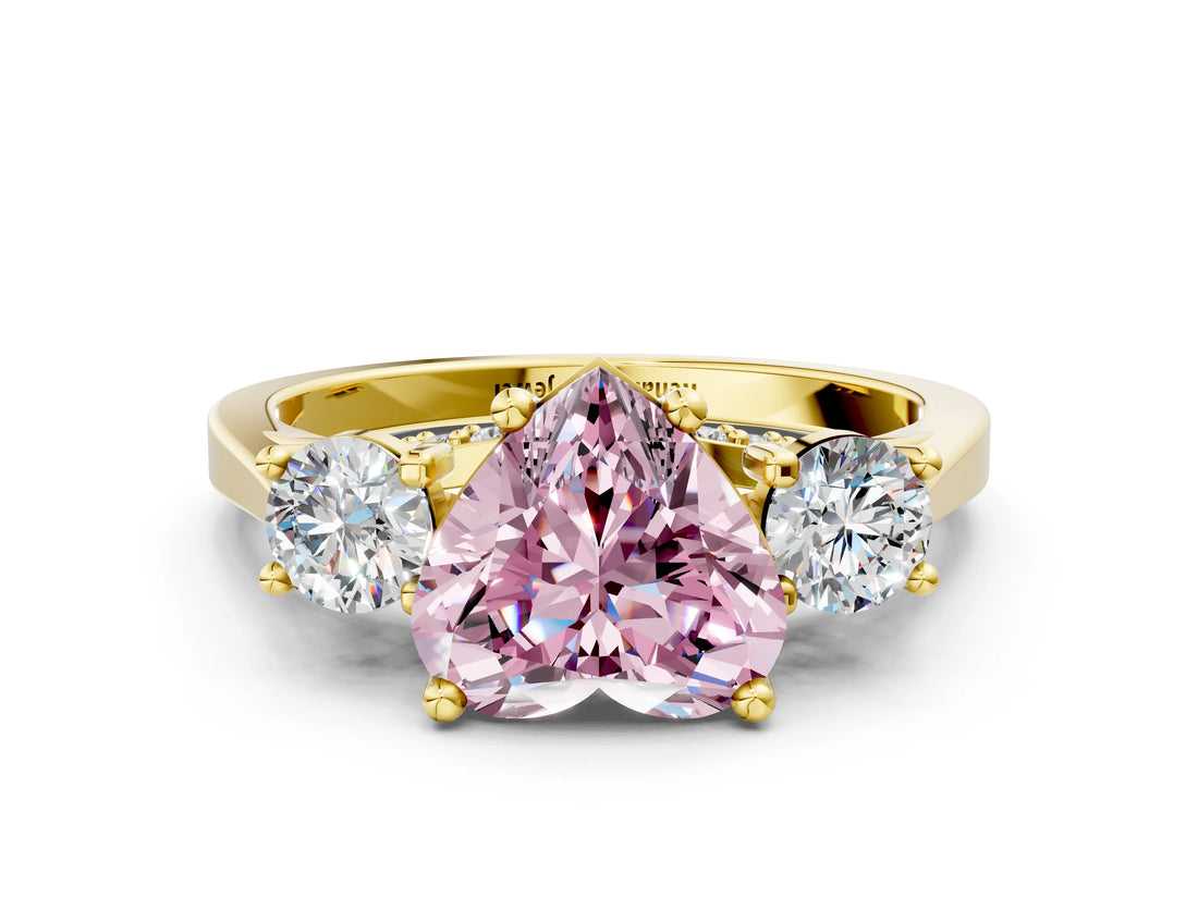 Yellow gold Fancy Pink Heart Cut Diamond Three-Stone Engagement Ring with Prong Setting and Pavé Band