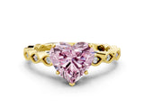 Yellow gold Fancy Pink Heart Cut Solitaire Diamond Ring with Infinity Twist Band and Four-Prong Setting