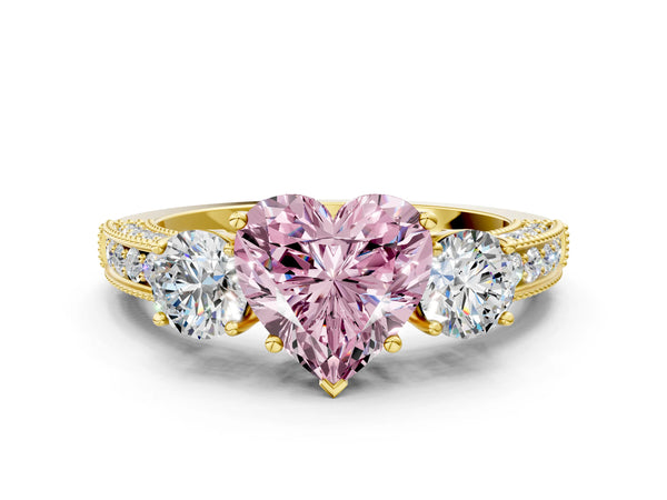 Yellow gold Fancy Pink Heart Cut Three-Stone Diamond Ring with Pavé Band and Four-Prong Setting