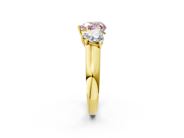 Yellow gold Fancy Pink Heart Cut Three-Stone Diamond Ring with Prong Setting on a Classic Band