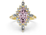 Yellow gold Fancy Pink Marquise Cut Halo Diamond Cluster Ring with Marquise and Round Stones on a White Gold Band with Prong Setting