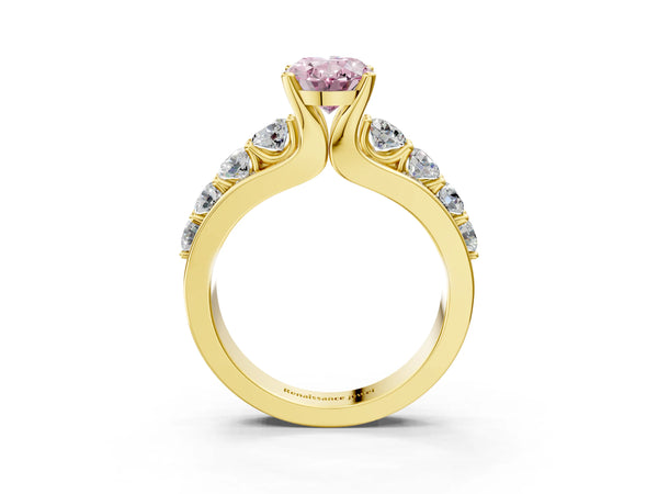 Yellow gold Fancy Pink Oval  Brilliant Solitaire with Side Stones on a Pave Band and Four-Prong Setting