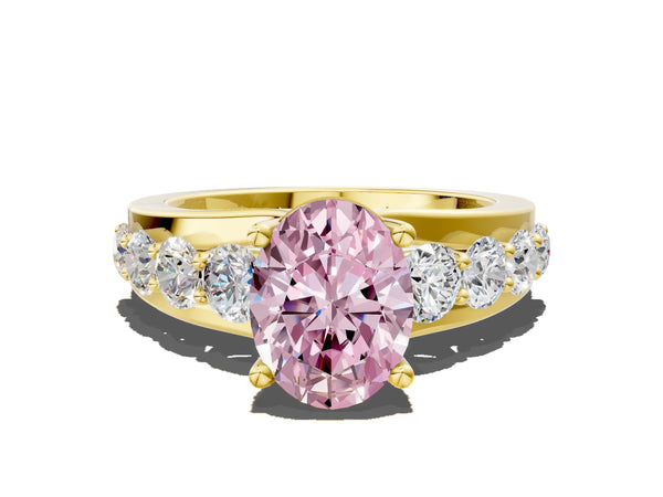 Yellow gold Fancy Pink Oval  Brilliant Solitaire with Side Stones on a Pave Band and Four-Prong Setting