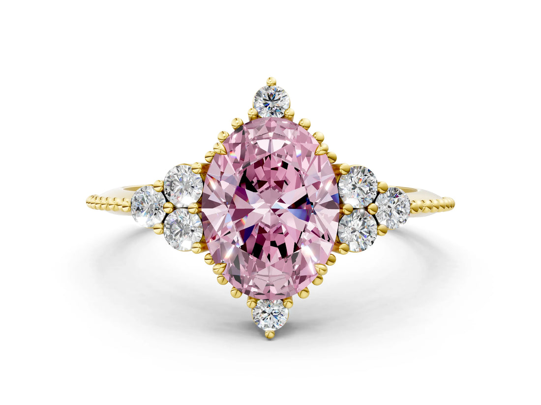 Yellow gold Fancy Pink Oval Cut Brilliant Diamond with Cluster Setting on a Beaded Band and Four-Prong Setting