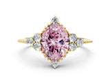 Yellow gold Fancy Pink Oval Cut Brilliant Diamond with Cluster Setting on a Beaded Band and Four-Prong Setting