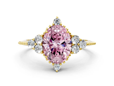 Yellow gold Fancy Pink Oval Cut Brilliant Diamond with Cluster Setting on a Beaded Band and Four-Prong Setting