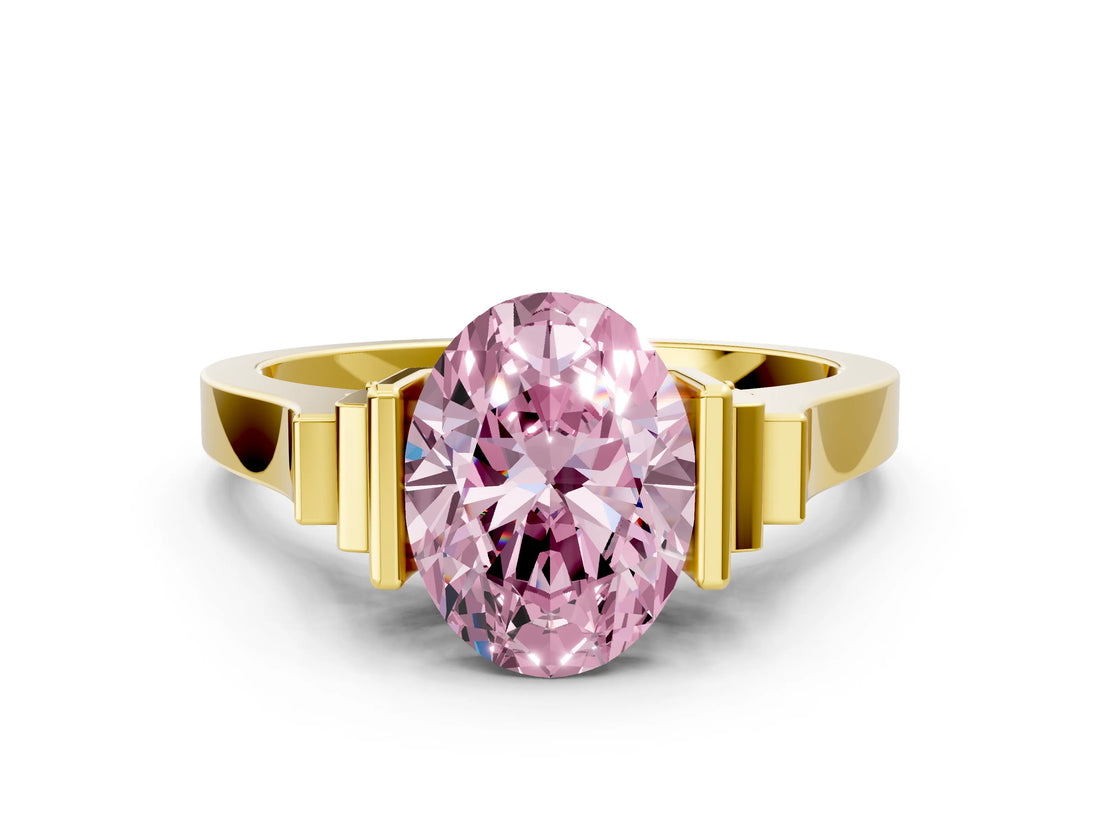 Yellow gold Fancy Pink Oval Cut Brilliant Solitaire Diamond Ring with Channel Set Band and Bar Prong Setting