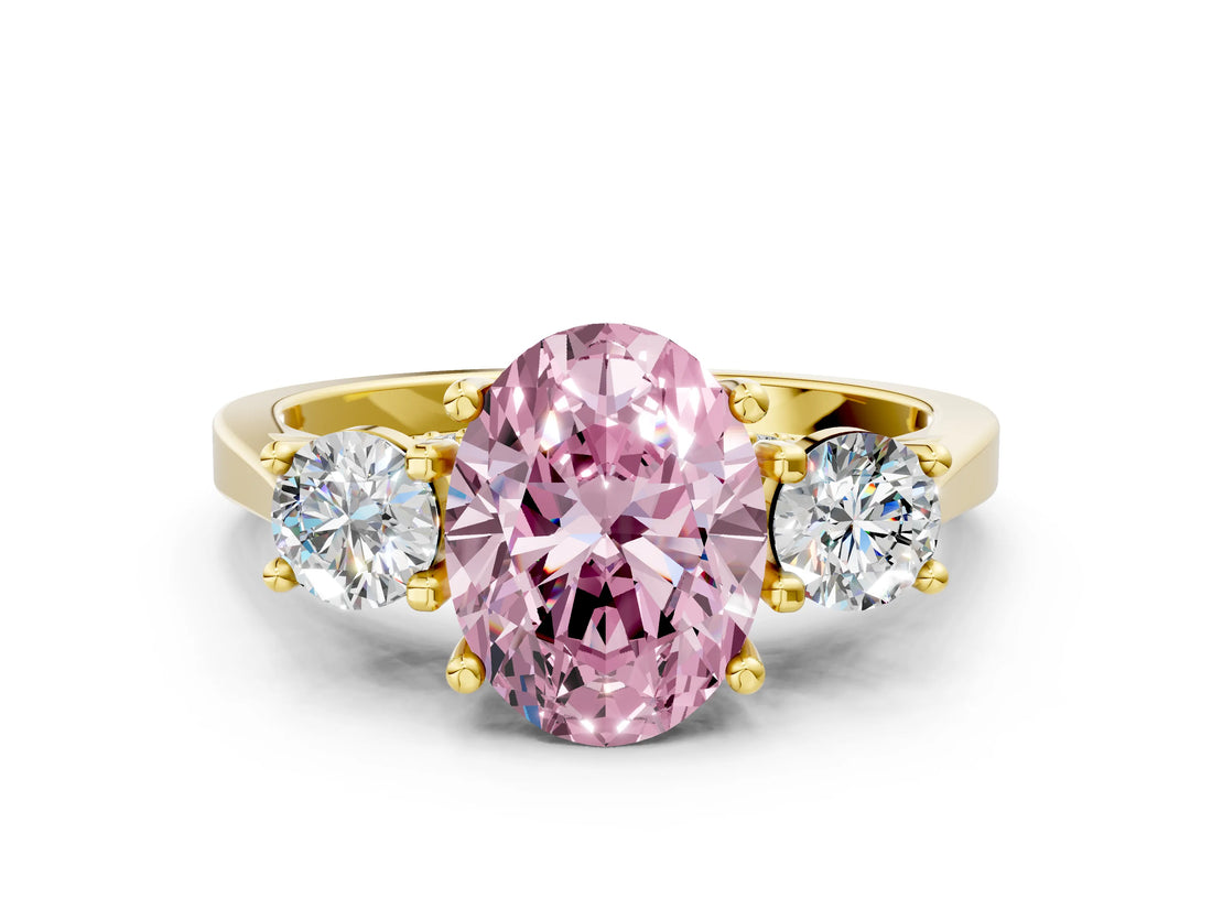 Yellow gold Fancy Pink Oval Cut Diamond Three-Stone Engagement Ring with Prong Setting and Pavé Band
