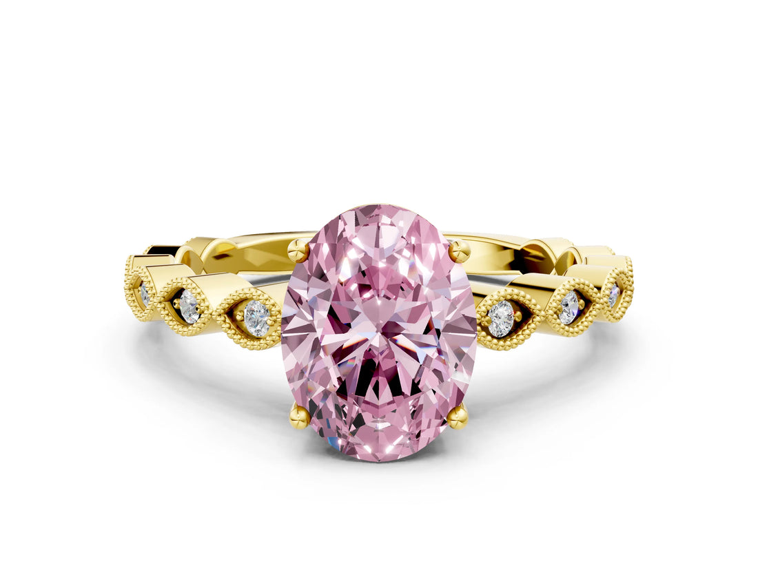 Yellow gold Fancy Pink Oval Cut Solitaire Diamond Ring with Infinity Twist Band and Four-Prong Setting