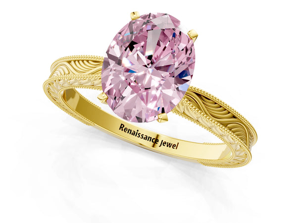 Yellow gold Fancy Pink Oval Cut Solitaire Milgrain Engraved Band with Four-Prong Setting