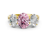 Yellow gold Fancy Pink Oval Cut Three-Stone Diamond Ring with Prong Setting on a Classic Band_12