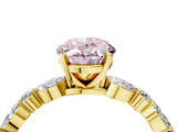 Yellow gold Fancy Pink Oval  Solitaire with Side Stones on a Pavé Band and Four-Prong Setting_27
