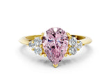 Yellow gold Fancy Pink Pear Cut Cut Diamond Cluster Ring with Solitaire Band and Four-Prong Setting