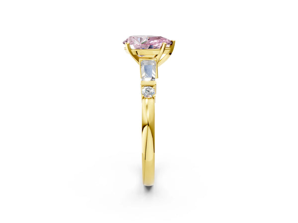 Yellow gold Fancy Pink Pear  Cut Diamond Ring with Baguette Side Stones, Channel Set Band, and Four-Prong Setting