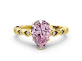 Yellow gold Fancy Pink Pear Cut Solitaire Diamond Ring with Infinity Twist Band and Four-Prong Setting