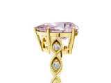 Yellow gold Fancy Pink Pear Cut Solitaire Diamond Ring with Infinity Twist Band and Four-Prong Setting_5
